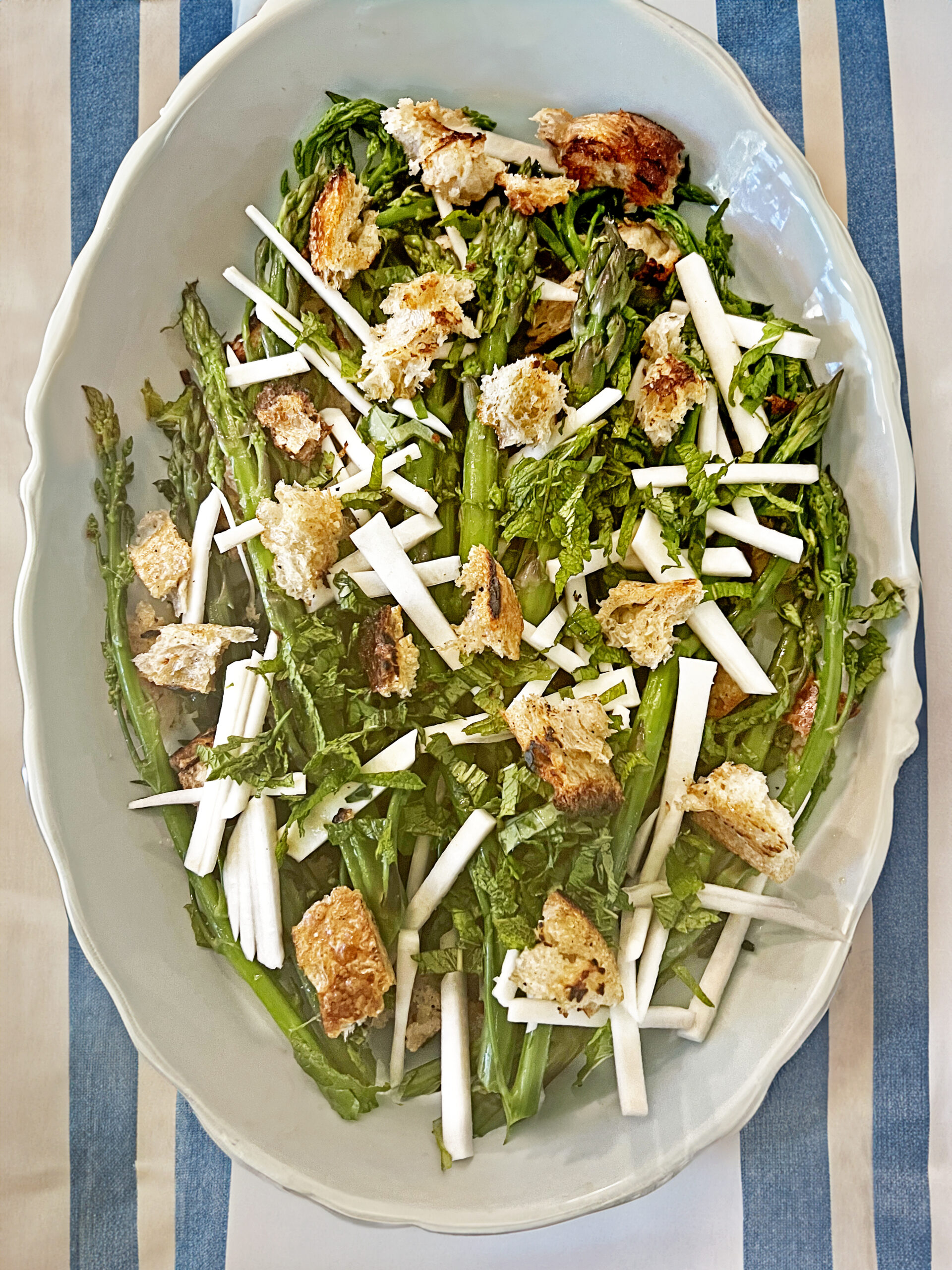 Don't wait for tomatoes — use the basic idea of panzanella to inspire other salad creations, too. (Photo credit: Amy Zavatto)