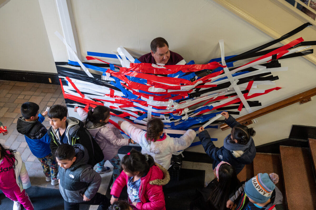 Students duct tape principal to wall at Roanoke Ave Elementary School —  their reward for a stellar 'reading week' - Riverhead News Review, image size:1200x798