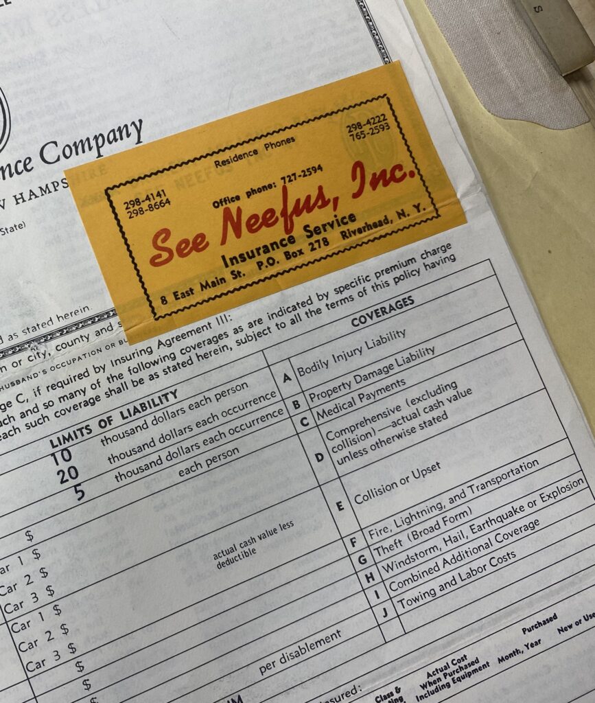 Insurance policy document with "See Neefus, Inc." sticker and coverage details.