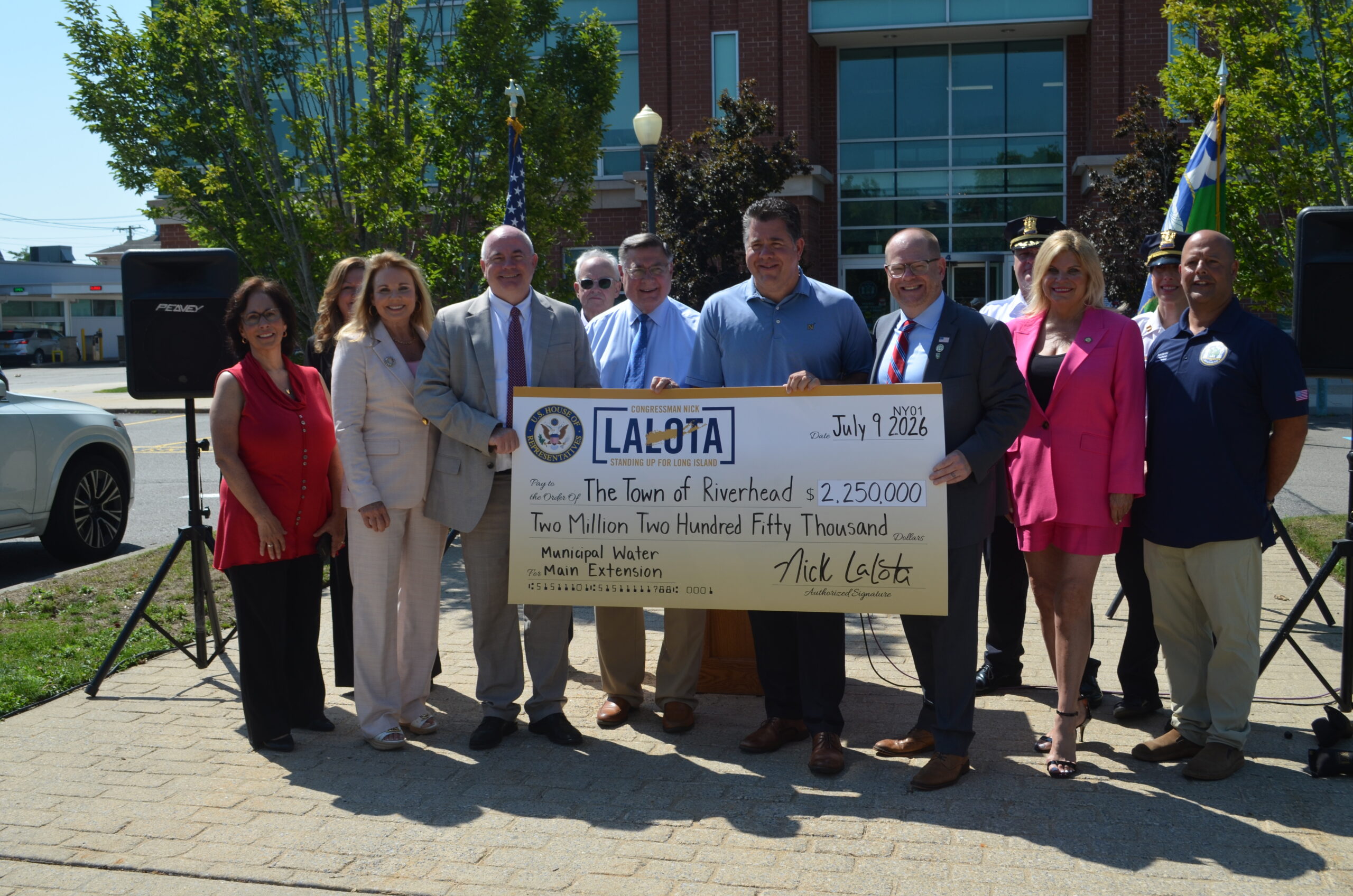 LaLota presents $2.25M check to help Riverhead's water main extension project in Calverton