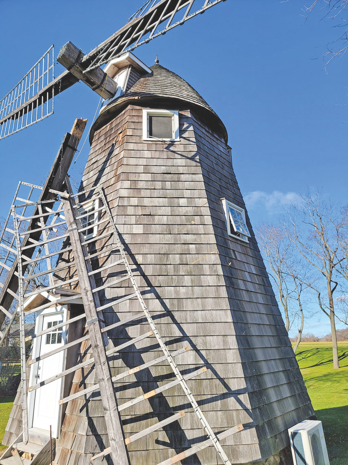 Damaged Aquebogue windmill receives three sails from Sylvester Manor ...