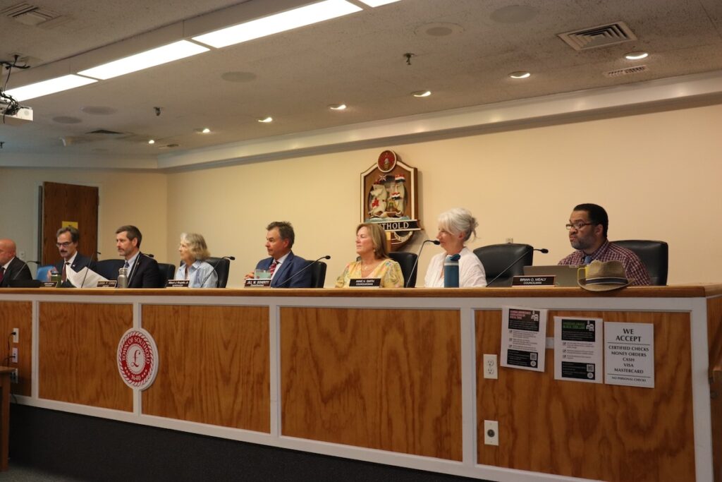 The Southold Town Board sits on their dais during a regular town board meeting.