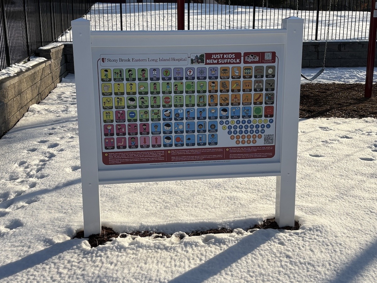 New Suffolk Just Kids students put new communication board to good use