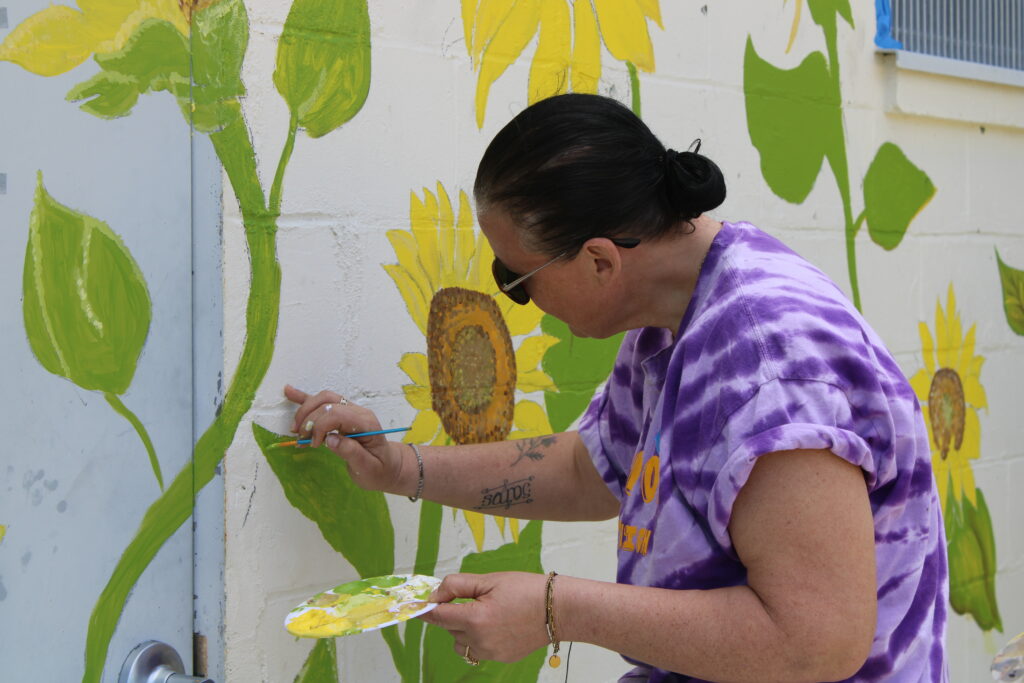 Greenport students kick off Fifth Street beach mural repainting project
