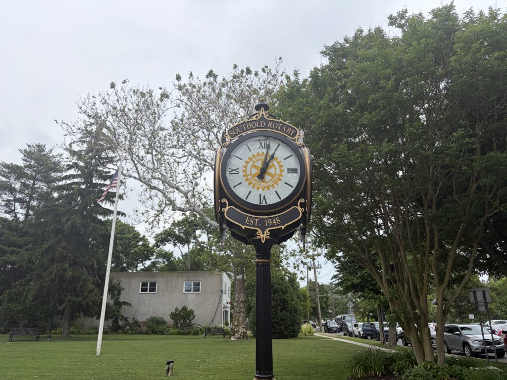 New clock at Silversmith’s Corner honors longtime Southold Rotarians