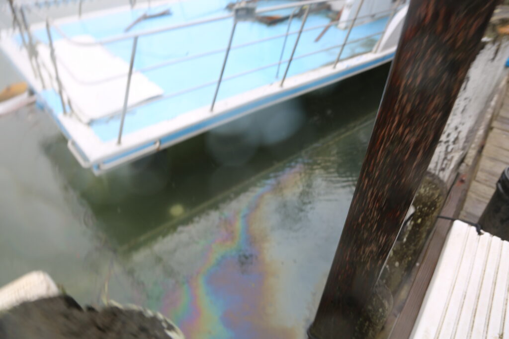 Sinking charter boat leaks fuel, poses environmental threat in Mattituck Inlet