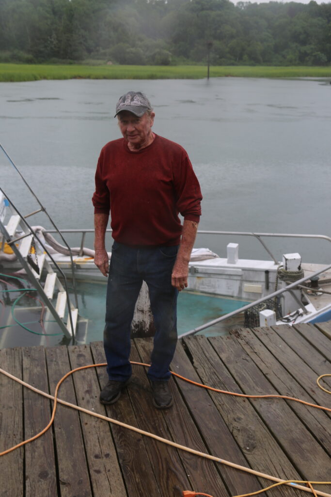 Sinking charter boat leaks fuel, poses environmental threat in Mattituck Inlet