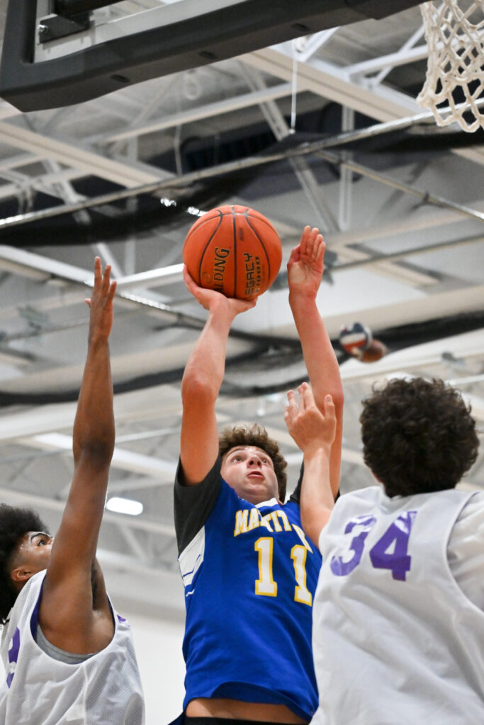 Mattituck’s Connor Searl’s three-day athletic feat includes triathlon, hoops win over Greenport