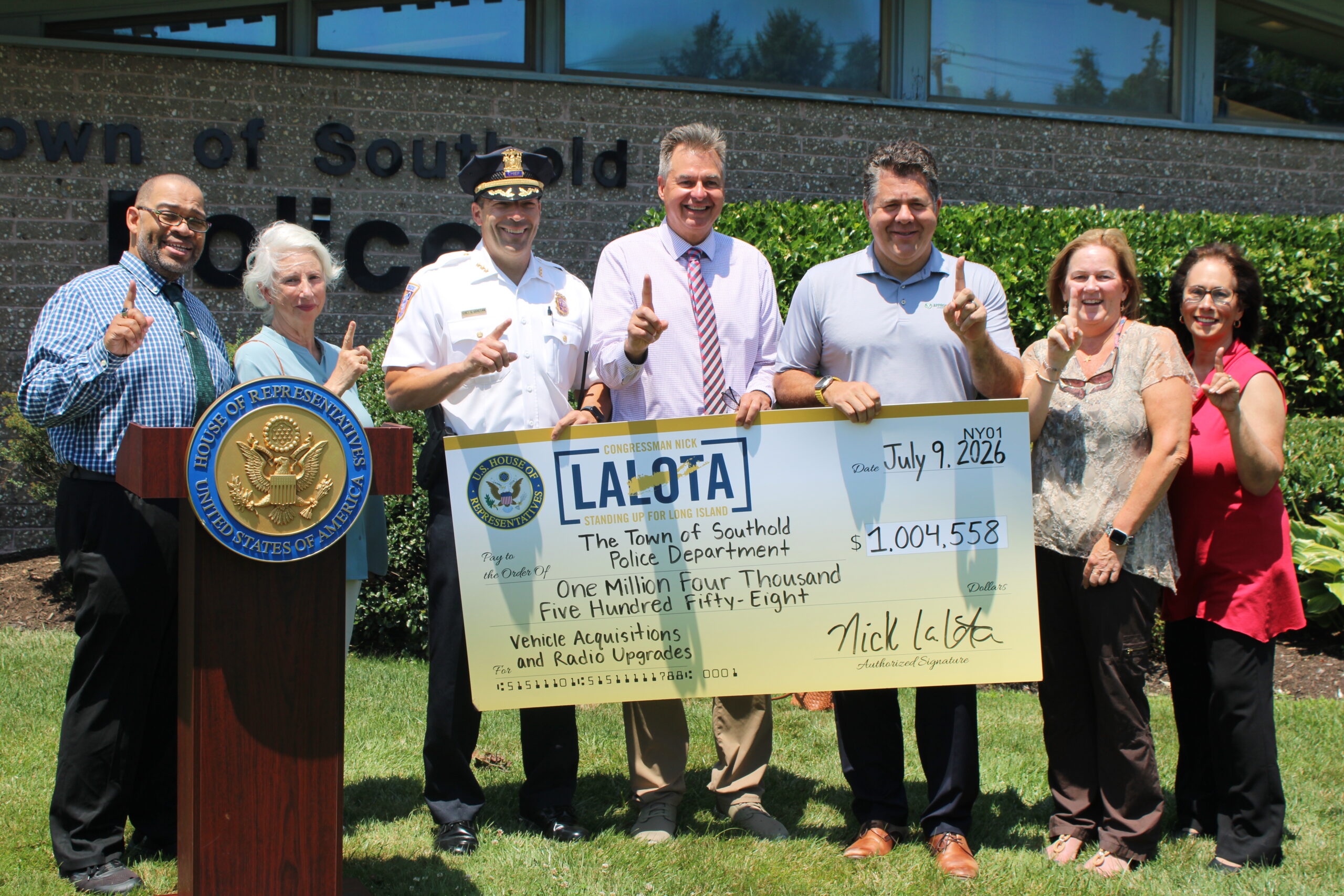 Southold police, officials celebrate $1M federal grant for vehicle, radio upgrades